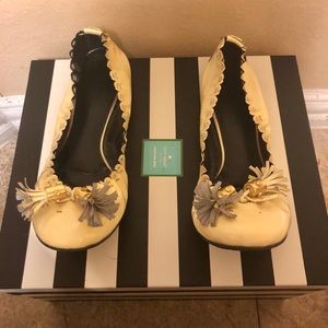 Tory Burch “Reese” Cream patent leather flats